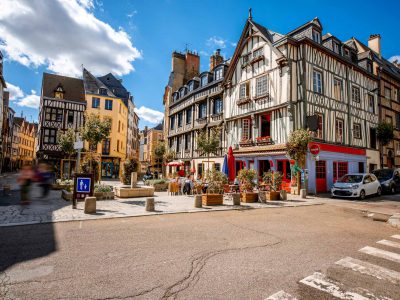 Cozy square with beautiful buildings and cafes in Rouen city, the capital of Normandy region in France