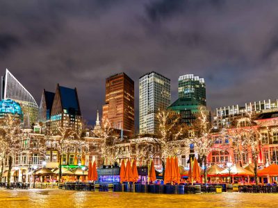 Night cityscape of the Hague from Het Plein Square. The Netherlands